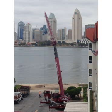 Crane next to water